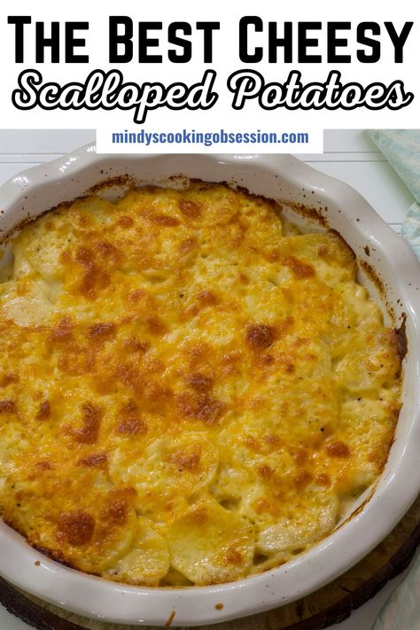 Sliced potatoes are layered with a creamy cheese sauce, topped with more cheddar cheese then baked until the potatoes are tender and the cheese is golden brown. Made with Russet potatoes, onion, butter, milk, flour, salt and pepper, it's the perfect side dish for Sunday dinner or holiday dinner. via @mindyscookingobsession Slow Cooker Russet Potatoes, Cheese Scalloped Potatoes Easy, Scalloped Potatoes With Milk, Scalloped Potatoes Easy Quick Simple, Russet Potato Recipes Side Dishes, Cheesy Scalloped Potatoes Easy, Russet Potato Side Dishes, Best Cheesy Scalloped Potatoes, Easy Cheesy Scalloped Potatoes Recipe