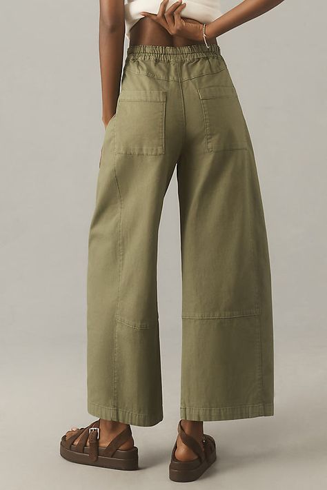 Meet Izzie, a true, take-it-easy pair. Defined by a curved leg that gently tapers at the ankle, the look is casual, with attitude. Glowing reviews confirm that she has made 100s of people very happy. | The Izzie Relaxed Pull-On Barrel Pants by Pilcro in Green, Women's, Size: Large, Cotton/Elastane at Anthropologie Side Leg Jeans, Fun Pants Women, Green Barrel Pants Outfit, Travel Clothes Women Summer, Winter Pants For Women, Womens Winter Pants, Barrel Pants, Wardrobe List, Chill Style