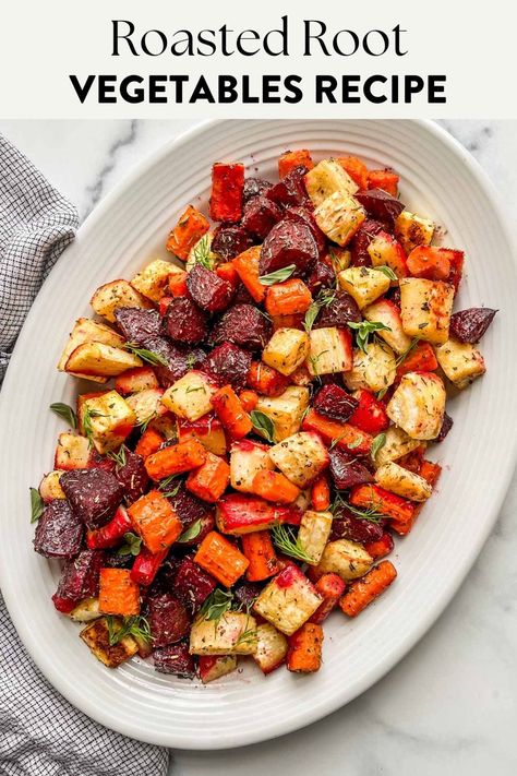 Oven roasted root vegetables on a large serving platter. Oven Roasted Root Vegetables, Roasted Fall Vegetables, Root Vegetables Recipes, Roasted Veggies In Oven, Colorful Carrots, Roasted Root Veggies, Thanksgiving Vegetables, Roasted Vegetables Oven, Healthy Side Dish