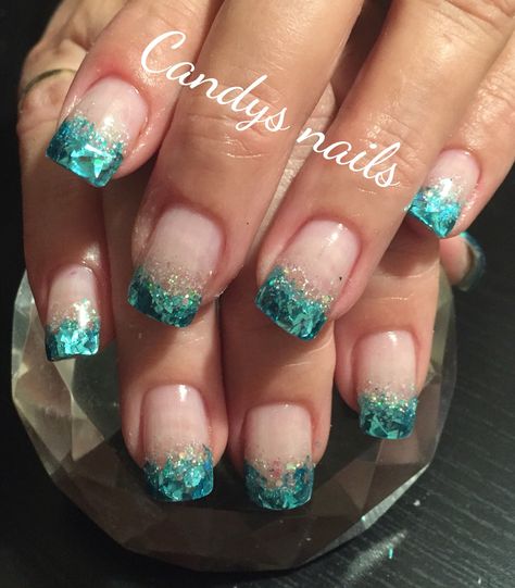 Teal glitter tip fade acrylic nails! Teal Glitter Nail Designs, Fade Acrylic Nails, Teal And Gold Nails, Teal Green Ombre Nails, Teal And Gold Glitter Nails, Black Nails With Teal Glitter, Teal Sparkle Nails, Teal And White Glitter Nails, Aladdin Theme