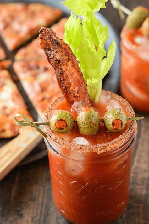 This easy bloody mary recipe tastes delicious and is great for a brunch get together. Pair it with some pizza and you'll want to host brunch every day! #recipesforbloodymary #recipesforbloodymarymix #spicybloodymaryrecipe #spicybloodmary #bloodymary #drinkrecipe #cocktailrecipe #bloodymarycocktail #baconbloodymary #bloodymarywithbacon Spicy Bacon, Perfect Brunch, Brunch Cocktails, Classic Cocktail, Alcohol Drinks, Bacon Recipes, 5 O Clock Somewhere, Daiquiri, Alcohol Recipes