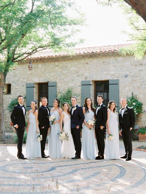 Tuscan-inspired wedding in Scottsdale, Arizona via Magnolia Rouge Dusty Blue Wedding Black Suit, Light Blue Bridesmaid Dresses Black Suits, Black Tux Blue Bridesmaid, Black And Light Blue Wedding, Blue Bridesmaid Dresses With Groomsmen, Light Blue And Black Wedding, Dusty Blue And Black Wedding, Blue Bridesmaid Gowns, Navy Tux