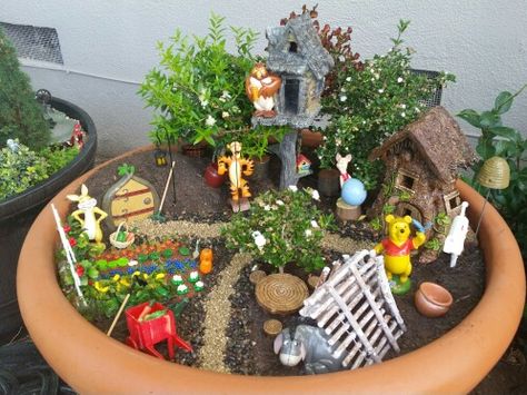 Winnie The Pooh Garden Winnie The Pooh Garden, Miniature Gardens Design Ideas, Miniature Garden Design, Storybook Gardens, Dinosaur Garden, Disney Garden, Fairy Garden Designs, Faeries Gardens, Dish Garden