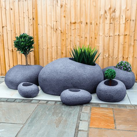 Zen Pebble Outdoor Planter | Garden & Outdoor Planters | Nustone #Exploring #Tranquility #Outdoor #DecorTips #Kitchens #and #HomeDecorating #Elevating #the #Living #InteriorInspo #Garden #of #HomeInspiration #Spaces #Garden #Beauty Patio With Potted Plants, Sandstone Paving Slabs, Low Maintenance Backyard, Patio Kits, Grey Paving, Side Patio, Granite Paving, Outdoor Porcelain Tile, Coast House