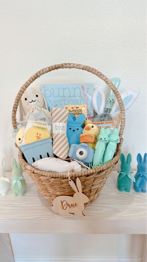 Easter basket from Pottery Barn Kids, filled with toys, candy and stuffers for little boys. Egg Topiary Tree, Easter Egg Bag, Easter Egg Filling, Easter Table Centerpieces, Boys Easter Basket, Nursery Baskets, Easter Table Runners, Kids Baskets, Holiday Baskets