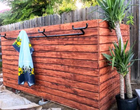 Outdoor DIY Pool pump wall cover using wood paneling , copper to make towel rack and solar panel lights Pool Pump Cover Ideas, Pump Cover Ideas, Pool Pump Cover, Pool Equipment Cover, Pool Equipment Enclosure, Landscaping Around Pool, Pool Shed, Living Pool, Pools Backyard Inground