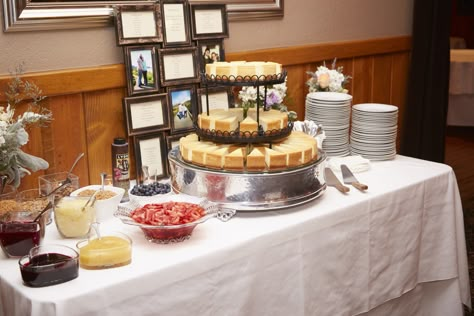 Wedding cheesecake bar with many toppings. Cheesecake Buffet Wedding, Mini Cheesecake Bar Wedding, Build Your Own Cheesecake Bar, Cheesecake Bar At Wedding, Cheesecake Station Wedding, Cheesecake Bar Wedding Ideas, Cheesecake Bars Wedding, Cheesecake Grooms Table, Cheesecake Toppings Bar Ideas