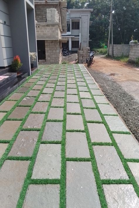 Create an enchanting landscape that seamlessly blends the rugged charm of Tandoor Stone with the vibrant allure of Artificial Grass. Our 25mm Artificial Grass adds a touch of evergreen splendor, providing a soft and inviting carpet that stays lush all year round, with minimal maintenance required. Experience the joy of outdoor living with this eco-friendly solution. #OutdoorLiving #TandoorStone #ArtificialGrass #EcoFriendlyLandscaping #GardenDesign #TransformYourSpace Grass Floor, Enchanting Landscape, Grass Carpet, House Design Ideas, Artificial Grass, Stone Flooring, Floor Design, Home Exterior, Garden Design