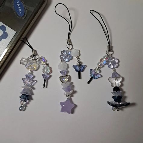 Cute Purple Acubi Styled Phone Charm!!! 🤍 _ ✿$12.50 each + shipping. Free shipping on orders over $35. _ ✿Style A (Available) ✿Style B (Available) ✿Style C (Available) _ ✿Made with: glass beads, acrylic beads, phone charm strap landyard, zinc alloy charm(s), and stainless steel tarnish-resistant wire _ Available on my Etsy. Link in Bio ~ 🤍 _ _ _ _ _ #accessories #jewelry #jewelrymaking #bracelets #charmbracelets #beadedjewelry #beadedbracelets #beadsjewelry #beads #fyp #fypシ #explore #e... Purple Phone Charm, Jewelry Rack, Bracelets Design, Bottle Charms, Bead Charms Diy, Cute Accessories, Fashion Y2k, Diy Bracelet Designs, Phone Charms