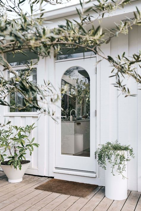 Side door to a renovated mid-century modern beach shack on the Mornington Peninsula, VIC. The door is original to the home which dates back to the 1950s | Photography: Marnie Hawson Mid Century Apartment, In Ground Trampoline, Three Birds Renovations, Landscaping Business, Homes To Love, House Beach, Beach Shack, Beach Bedroom, Modern Beach