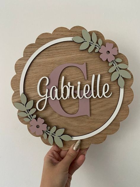 Create custom door name plaques and acrylic toppers for a unique touch. Perfect for twins' parties or as thoughtful favors, these laser cut wood crafts add a personal flair. Door Name Plaque, Door Sign Name, Cricut Plaque Ideas, Bedroom Door Name Signs, Kids Name Signs For Room, Glowforge Aura, Wood Baby Name Sign, Plaque Ideas, Nursery Wood Sign