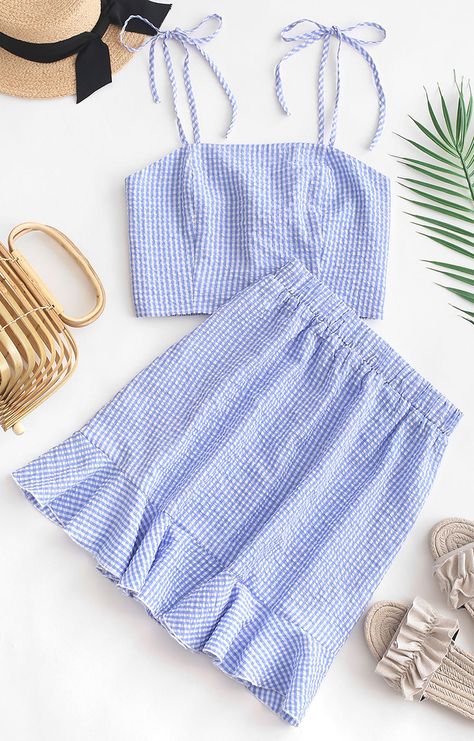 The seersucker fabric gives a unique touch of our new fresh style! Featuring a fresh gingham pattern, the crop top has slim self-tie shoulder straps and stretchy smocking back to perfect the fit. The matching skirt is cut in a slight A-line silhouette with graceful ruffled hemline. Mix and match solely can meet up with various summer look you have ever seen. Occasion: Casual,Daily,Going Out Style: Fashion Fit Type: Regular Collar-line: Spaghetti Straps Sleeves Length: Sleeveless Material: P Set Aesthetic, Top With Skirt, Sewing Set, Seersucker Fabric, Flounce Skirt, Trendy Fashion Tops, Gingham Pattern, Crop Top Outfits, Diy Sewing Clothes