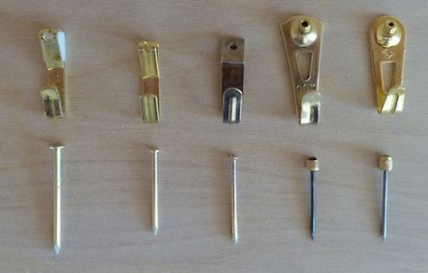 Very detailed article on different kinds of picture hooks.  Left to right: Regular Ook, Hillman, Moore, Professional Ook, Floreat. Picture Hanger, How To Properly Hang Pictures, Proper Height To Hang Pictures, Hanging Picture Hacks Tips, Frame Hanging Hacks, Picture Hangers Hardware, Picture Rail Hanging, Picture Hanging Tips, Hanging Pictures On The Wall