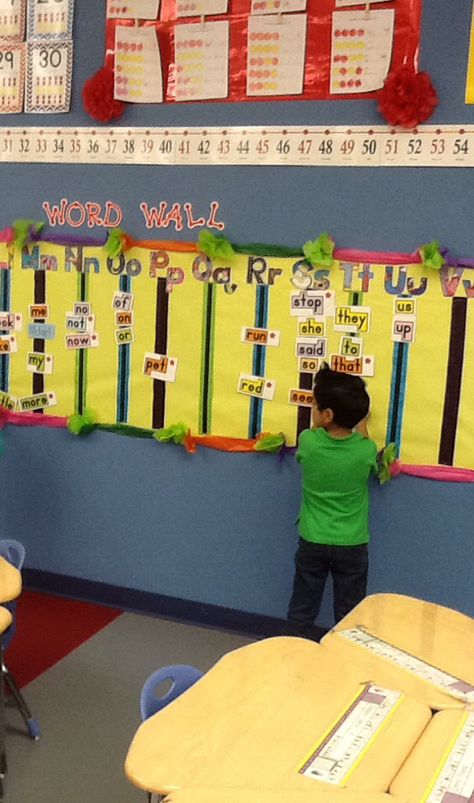 Kindergarten Word Wall: make it interactive by placing it lower and use magnetic tape on ribbon.  Idea brought to you by Krazy Kats in Kinder on TPT! Interactive Alphabet Wall, Magnetic Word Wall, Interactive Boards Preschool, Phonics Wall Kindergarten, Interactive Word Wall Kindergarten, Word Wall Kindergarten, Sight Word Wall, Phonics Wall, Interactive Word Wall