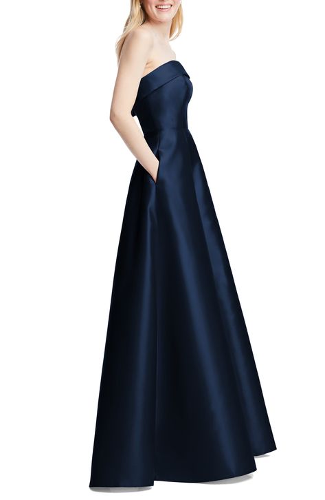 This strapless satin gown with a structured bodice and side-slant pockets features a twirl-ready full circle skirt. 54 1/2" length (size 8) Square neck Strapless Lined 100% polyester Dry clean or hand wash, line dry Imported Navy Blue Bridesmaid Dresses, Alfred Sung, Full Circle Skirt, Guest Attire, Prom Dress Inspiration, Blue Bridesmaid Dresses, Grad Dresses, Satin Gown, Gala Dresses