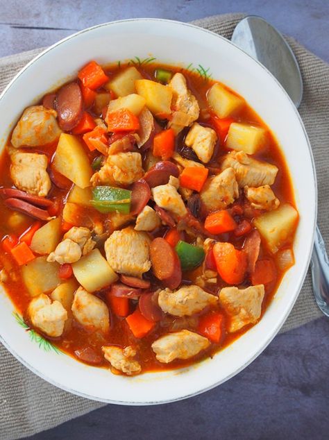 One-Pan Chicken Menudo with chicken, potatoes, carrots, bell peppers in a thick, flavorful tomato sauce. This hearty stew is easy to make, economical, and sure to be a crowd favorite! Chicken Menudo Recipe, Chicken Menudo, Menudo Recipe, Hearty Stew, Pinoy Recipes, Creamy Chicken Pasta, Filipino Style, Tomato Gravy, Potatoes Carrots