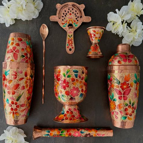 **IMPORTANT INFORMATION TO CONSIDER BEFORE ORDERING: PRODUCTS ARE 100% HANDMADE, THEREFORE, ALLOW 20 DAYS FOR PRODUCTION PER PRODUCT MENTIONED ON "PRODUCT PAGE" OF ITEM WITH TENTATIVE SHIPPING AFTER DEADLINE DATE. DEADLINE TO ORDER: 9/30/24 Mexican Handmade Copper Barware & Bar Tools- LYYE Flowers Discover the ultimate Mexican artisan copper bar set tools—a must-have for the best bartending cocktails. Hand-hammered, hand-painted, and hand-engraved by skilled Mexican artisans, this set is a true Clase Azul Bottle Decor, Mexican Colors Kitchen, Mexican Bar Decor, Mexican Kitchen Decor Ideas Hacienda Style, Funky Home Bar, Mexican Bar Ideas, Mexican Home Decor Kitchen, Mexican House Decor, Mexican Houses Interior