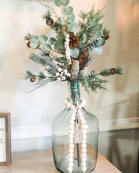 Eucalyptus Christmas Decor Vase, Green And Grey Christmas Decor, Christmas Greens In Vase, Sage And White Christmas Decor, Christmas White And Green, Green And Wood Christmas Decor, Sage Green And White Christmas Decor, Christmas Glass Vase Decor, Winter Vase Decor