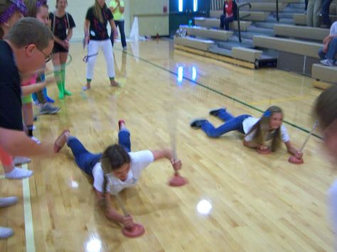 A super easy game for a rally or assembly. You just need a few plungers and have the kids lay on their stomachs and pull themselves across the floor in a race!   {Bishop Manogue High School, Reno} Assembly Games Elementary, Fun High School Assembly Games, Pepfest Games, High School Assembly Games, Fun Pep Rally Games High Schools, Pep Rally Game Ideas High Schools, High School Assembly Ideas, Rally Games High School, Pep Assembly Games High School