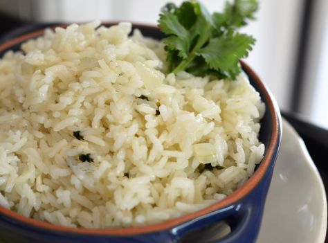 Allrecipes Brazilian Rice  Delicious & Easy Brazilian Recipes Available on Allrecipes!  #MyAllrecipes #AllrecipesAllstars #AllrecipesFaceless Brazilian Rice, Coconut Jasmine Rice, Cafe Rio, Easy Butter, Lime Rice, Cilantro Lime Rice, Rice Pilaf, Brazilian Food, Cilantro Lime