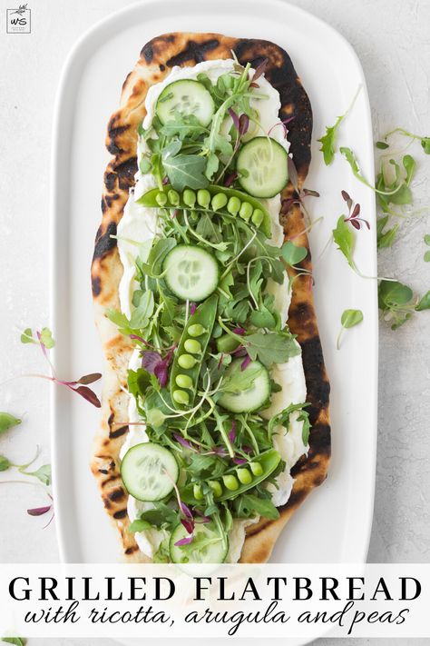 This grilled flatbread is the epitome of spring. A chewy, charred flatbread is topped with sweet creamy ricotta, peppery green salad and crunchy vegetables. Add this to your Mother's Day Brunch menu! Follow me on Pinterest for more recipes like this! Summer Ricotta With Grilled Vegetables, Spring Flatbread, Spring Grilling Recipes, Recipe With Ricotta, Homemade Artisan Bread, Crunchy Vegetables, Grilled Flatbread, Flatbread Recipe, Make Ahead Appetizers