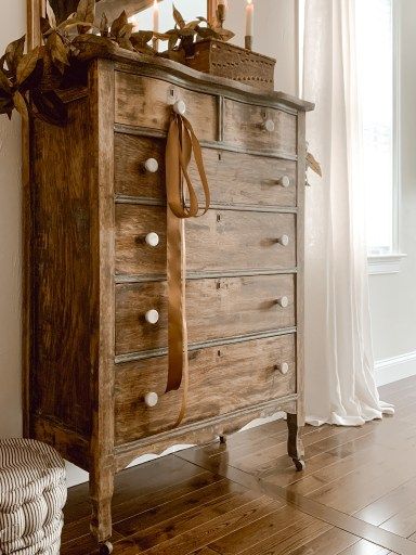 How to Style a Dresser in the Living Room for Fall - Dresser In The Living Room, How To Style A Dresser, Style A Dresser, Dresser In Living Room, Gold Candlestick Holders, Room Dresser, Chic Style Inspiration, Gold Candle Sticks, Book Baskets