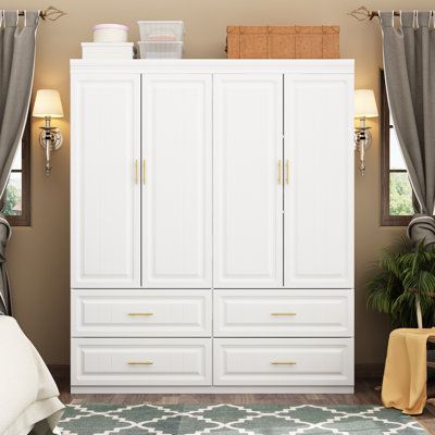 The white finish paired with golden metal handles makes the wardrobe more exquisite and elegant, suitable for any home decoration environment. Hidden behind four doors, there is a huge storage space that meets the needs of a family's clothing storage. The four large drawers at the bottom can be classified to store your cosmetics, skincare products, or small clothing. Take this wardrobe home and keep your bedroom clean and tidy from now on! | Wildon Home® Alzado Armoire Wood in Brown / White, Siz Laundry Room Storage Solutions, Laundry Room Tile, Laundry Room Colors, Laundry Room Wallpaper, Bedroom Cupboard, Laundry Room Flooring, Wood Armoire, Laundry Room Layouts, Bedroom Cupboard Designs