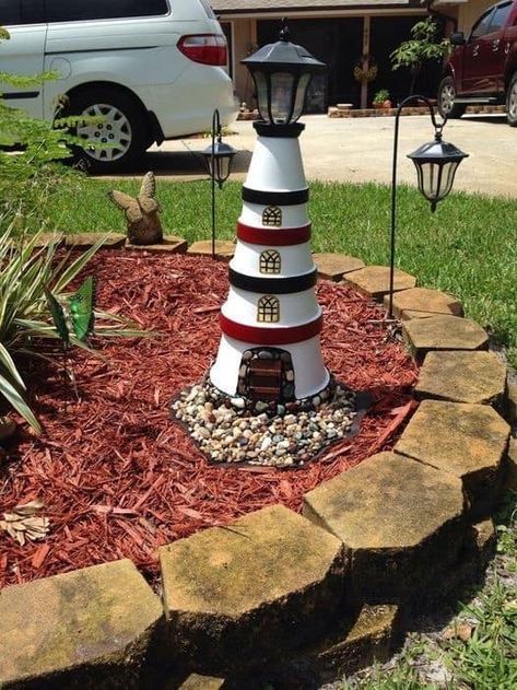 Dollar Tree Crafts, Creations, and Inspirations | DIY lighthouse using garden flower pots | Facebook Garden Lighthouse, Diy Lighthouse, Clay Pot Lighthouse, Terra Cotta Pots Garden, Lighthouse Crafts, Terra Cotta Pot Crafts Diy, Creative Garden Decor, Solar Lights Diy, Lighthouse Decor