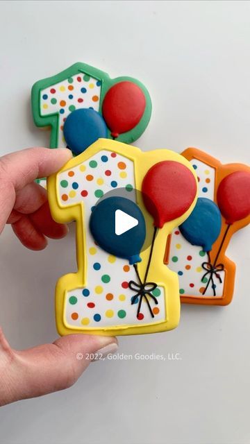 36K views · 2.6K likes | Joan | Custom Decorated Cookies | Olney, MD on Instagram: "Number balloon decorated sugar cookies are so cute for birthday party celebrations! This polka dot number 1 balloon cookie was made with royal icing transfers for the balloons in bright primary colors to match the theme of the birthday party.  • • Cutter @maddiescookieco  • • #birthdaycookies #numbercookies #firstbirthday #1stbirthday #partycookies #1yearold #decoratedcookies #decoratedsugarcookies #royalicingcookies #polkadots #primarycolors #cookiedecorating #cookiedecoratingvideo #cutecookies #designercookies #customcookies #ballooncookies #cookiesofinstagram #icingcookies #marylandcookies #montgomerycounty #olneymd #cookievideo #instacookies #cookieart" Number 1 Cookies, Number Cookies Royal Icing, Number 2 Cookies Decorated, Number Cookies Decorated, Number One Royal Icing Cookies, Number One Cookies 1st Birthdays, Number Four Cookies Decorated, Balloon Cookies, First Birthday Cookies