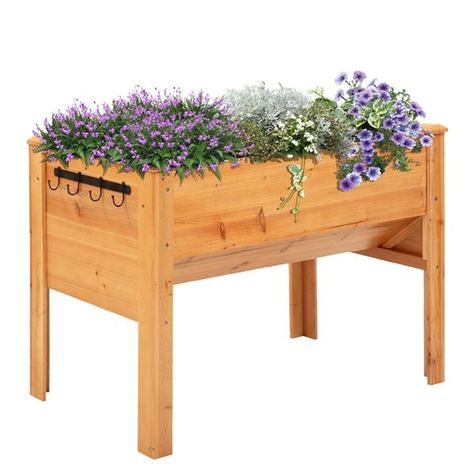 Made with high quality fir wood for stability and durabilityA raised garden with a funnel shaped planting areaHas 4 hooks to hang small toolsPerfect choice for patio, backyard, garden and more.Weight capacity: 750 lb. | Outsunny Outsunny 23.5-in x 48.75-in Wooden Raised Garden Bed with Hooks 845-367 Outsunny | 23.5-In X 48.75-In Wooden Raised Garden Bed With Hooks | Rona Table For Plants, Wood Raised Garden Bed, Elevated Planter, Plants For Raised Beds, Wooden Raised Garden Bed, Elevated Planter Box, Tool Hooks, Raised Garden Planters, Vegetable Planters