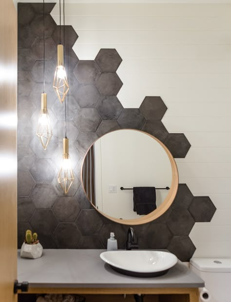 Unique geometric tile x shiplap design. Displayed on main floor half bath of stunning show home in Leduc Alberta. Bathroom Hexagon Backsplash, Hexagonal Interior Design, Hexagon Tile Bathroom Shower Wall Modern, Triangle Tile Bathroom, Unique Tile Shower Ideas, Octagon Tile Shower Wall, Half Tile Bathroom Walls, Half Bathroom Floor Ideas, Bathroom Hexagon Tile Wall