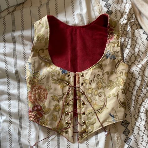 Reversible Renaissance Faire Corset/Bodice Top. Size “Purple” According To The Faire Sizing Conventions. Fits Like A Small To Medium. (I’m A 32 Bust/28 Waist And It Fits Me When Laces Are Pulled The Tightest.) Worn Once. Brand New Condition. Cleaned. Outside Is A Gold-Tone Floral Pattern And Inside Is A Sturdy Rust Colored Corduroy. Measurements (When Laces Are Strung Tight) Bust: 30 Inches Waist: 27 Inches Adjustable Fit With Lacing. French Revolution Fashion, Corset Top Pattern, Renn Faire, Sweet 16 Outfits, Fair Outfit, Fairytale Aesthetic, Fair Outfits, Clothing Reference, Ren Fair