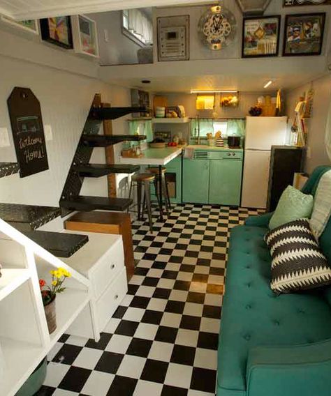 A black and white checkered floor with teal appliances create a retro theme in this tiny house. Tiny Homes Interior, Tiny Home Plans, Retro Garage, Tiny House Nation, Outdoor Kitchen Appliances, Tiny House Kitchen, Tiny House Interior, Garage House, Tiny House Living