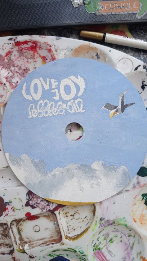 painted "pebble brain" album cover on a disc Pebble Brain Album Cover, Love Joy Band, Album Covers Painting, Lovejoy Pebble Brain, Painted Album Covers, Family Basement, Painted Cds, Album Cover Wall Decor, Brain Painting