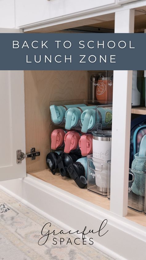 Lunch Station Organization, Organize Snacks On Counter, Lunchbox Storage Ideas Home, Toddler Plates Organization, Lunchbox Organization Kitchen, Lunch Bag Organization Ideas, Lunch Bag Storage Ideas, Kids Kitchen Cabinet Organization, Lunch Box Organization Storage