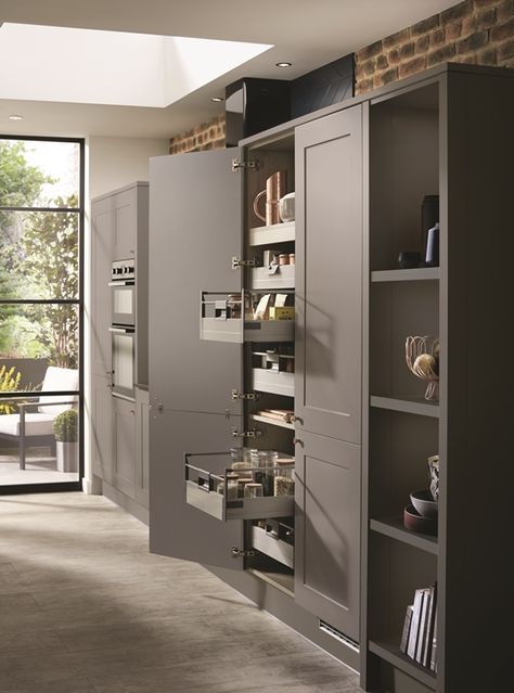 Tall larder units offer plenty of clever storage with a range of pre-fitted pull out shelves and drawers. This is our Chelford Slate Grey kitchen. See more at Howdens. Tall Units In Kitchen Storage, Kitchen Units Ideas, Bank Of Tall Kitchen Units, Kitchen Pull Out Larder, Howdens Pantry Cupboard, Pull Out Larder Cupboard, Howdens Larder Unit, Shallow Larder Cupboard, Wren Kitchen Larder Cupboard