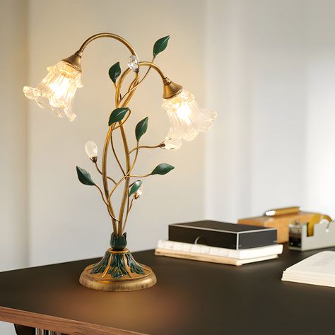 This table lamp has a retro and elegant appearance. Its base is decorated with climbing vines and small leaves, and the glass lampshade is like a flower. With its exquisite craftsmanship, it can enhance the beauty of the entire room. This retro and elegant table lamp will be an impressive decoration, its light is bright and stable, creating a warm and comfortable atmosphere to accompany you every night. With its 3 step dimming function, this table lamp gives you a variety of lighting options to Interior Design Per La Casa, Glass Lampshade, Climbing Vines, Cozy Room Decor, Delicate Flowers, Glass Flowers, Bedroom Aesthetic, Dream House Decor, Cool Stuff