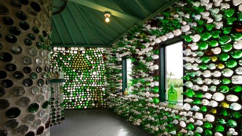 Recycled Building Materials | WTTW Chicago Plastik Recycling, Recycle Design, Recycled House, Bottle House, Eco Buildings, Sustainable Building Materials, Eco Friendly Cleaning Products, Appliances Design, Bottle Wall