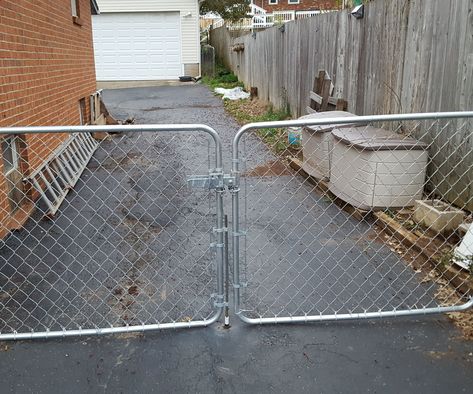 Dog-Proof Chain Link Fence Double Gate Latch Chain Link Gate Ideas, Double Gate Latch Ideas, Gate Lock Ideas, Painted Chain Link Fence, Gate Latch Ideas, Fence Double Gate, Dog Proof Fence, Chain Link Fence Installation, Chain Link Fence Gate