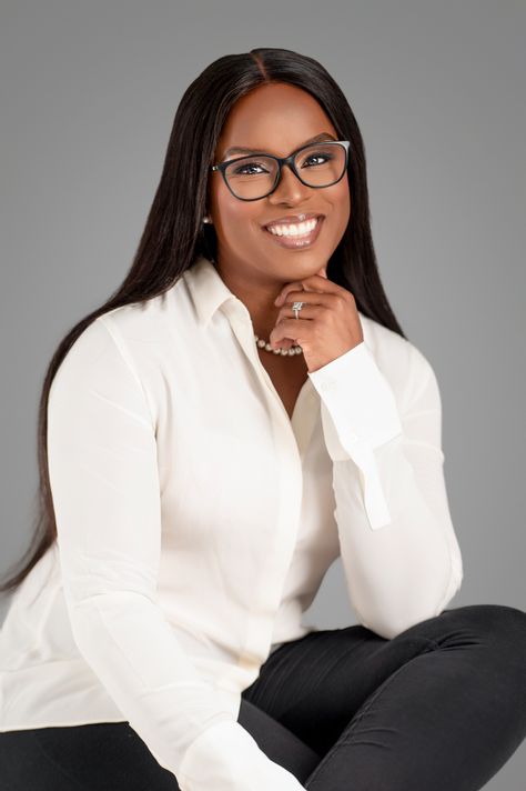 A beautiful black woman poses for professional headshots amongst a black background. See more of our professional headshots on our blog!  #headshots #professionalheadshots #blackwoman #headshotpose #headshotinspo #professionalheadshots #portraitphotography #lyndahwellsphotography Female Business Headshots, Glam Headshots Black Women, Women Headshot Poses, Linkedin Headshots Black Women, Professional Headshots Women Business, Outdoor Headshots Professional Black Women, Professional Headshots Black Women, Woman’s Professional Headshots, International Lawyer