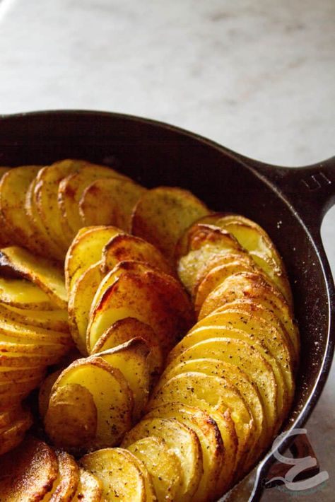 All you need for skillet potatoes is five ingredients, and two of them are salt and pepper! This recipe for skillet potatoes is one of the fastest ways to create an impressive side from pantry staples. Potato In Cast Iron Skillet, Cast Iron Dishes Meals, Cast Iron Potatoes Recipes, Cast Iron Skillet Potatoes And Onions, Potato Cast Iron Recipes, Cast Iron Skillet Potatoes Oven, Roasted Potatoes In Cast Iron Skillet, Cast Iron Vegetables, Scalloped Potatoes Cast Iron Skillet