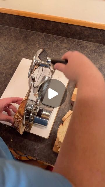 Adam Schihab on Instagram: "The handheld bread slicer in the video  is perfect for home use, offering a simple way to achieve uniform slices for sourdough and other breads. 

Its compact design makes it convenient for occasional slicing without taking up much space. 
#adamschihab 
However, for commercial settings, this tool may not be practical. In a professional kitchen or bakery, where large quantities of bread need to be sliced quickly and consistently, a more robust electric bread slicer would be necessary to meet the demands of high-volume service efficiently.#breadslicer #baker #sourdoughbread" Bread Warmer, Diy Bread, Bread Slicer, Professional Kitchen, Sourdough Bread, Compact Design, Simple Way, Butter, Bread