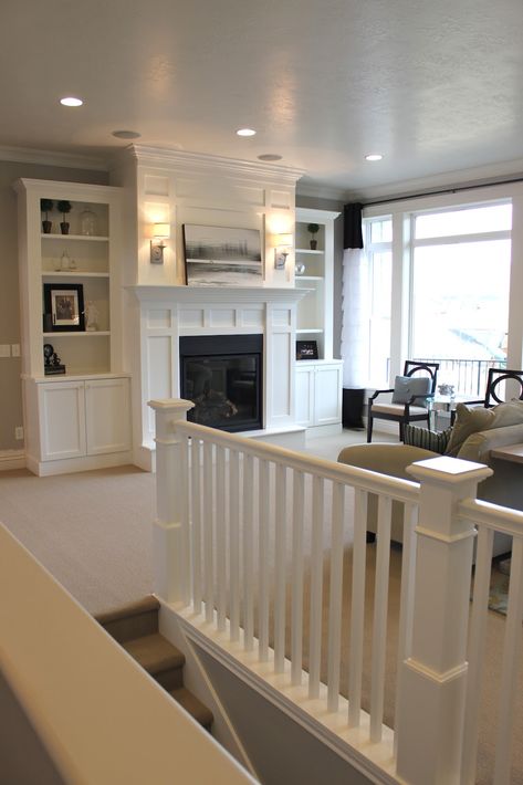 Beautiful white built-ins & gray walls make this bonus room / loft area! #lofts www.HomeChannelTV.com White Built Ins, Loft Area, Living Room Transformation, Fireplace Built Ins, Family Room Fireplace, Gray Walls, Room Transformation, A Living Room, Fireplace Surrounds