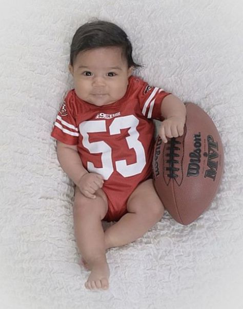 Football Milestone Pictures, Baby Football Photoshoot, Football Baby Photoshoot, Baby Football Pictures, Three Month Baby, Newborn Football, Monthly Photoshoot, 4 Month Old Baby, 9 Month Old Baby