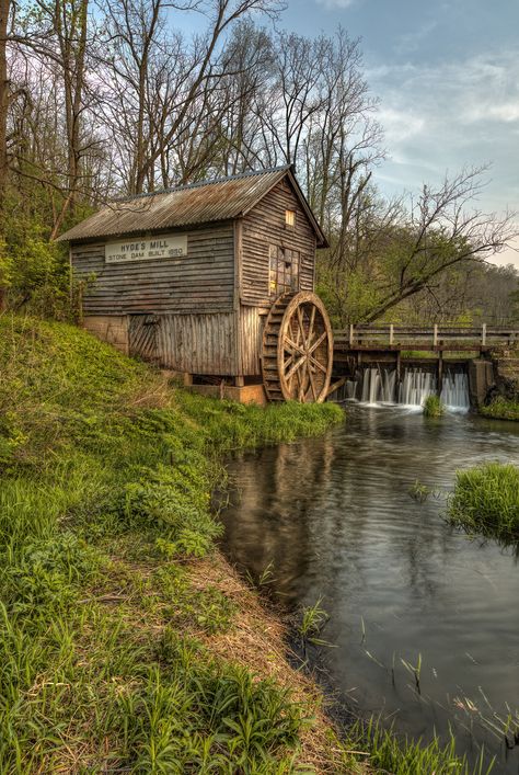 A waterwheel gristmill Old Grist Mill Water Wheels, House With Water Wheel, Waterwheel Minecraft, Cherry Wood Minecraft, Wood Minecraft, Waterwheel House, Minecraft Bridge, Old Grist Mill, Model Boats Building