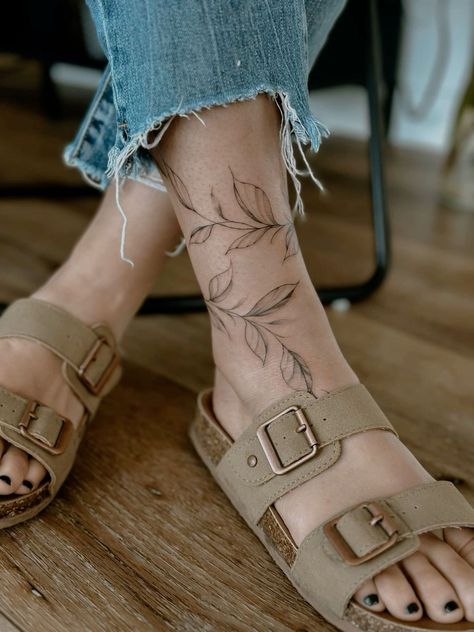 Vine Tattoos Ankle, Leaves Bracelet Tattoo, Woman Thigh Tattoos Unique, Ankle Flower Tattoo Wrap Around, Vine Tattoo Forearm, Tattoos Around Ankle, Floral Ankle Tattoo Wraps, Ankle Wrap Around Tattoo, Leg Wrap Around Tattoo