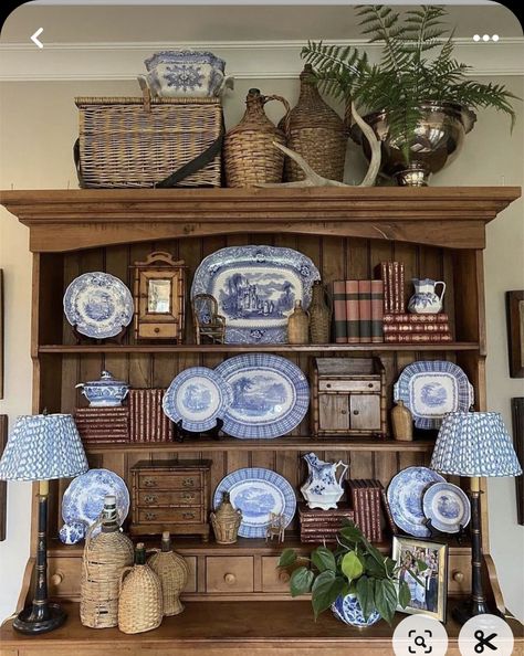 Breakfront Cabinet Styling, Blue And White Dishes Display, Baskets On Top Of Hutch, Antique Hutch Decorating Ideas, China Cabinet Display Ideas, Top Of China Cabinet Decor, Living Room Hutch Decorating Ideas, Top Of Hutch Decor, Style A China Cabinet