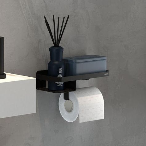 The Tiger Caddy toilet roll holder with shelf is an all-in-one bathroom solution. Its design incorporates a shelf that accommodates boxes up to 16cm x 11.2cm and a small compartment with high sides to prevent items from falling off. This allows you to store wet wipes, oil reed diffusers and other bathroom accessories with ease. Its striking black finish looks amazing in a modern bathroom while its antibacterial coating makes it easy to clean. The holder also comes with an impressive 10-year guar Toilet Roll Holder Shelf, Modern Toilet Paper Holders, Cloakroom Toilet, Wall Wardrobe Design, Bathroom Design Black, Small Toilet Room, Black Toilet, Toilet Brushes And Holders, Guest Toilet