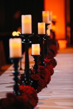 Candles on Black Candlestick Aisle Décor Or Centerpiece with Red Roses – shared on United with Love Dark Bedding, Ballroom Wedding Reception, Black Red Wedding, Wedding Colors Red, Masquerade Wedding, Halloween Themed Wedding, Bedding Ideas, Goth Wedding, Dark Wedding