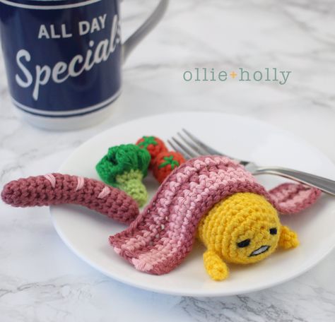 Free Gudetama Amigurumi Crochet Pattern - Ollie + Holly | Amigurumi Crochet Patterns Gudetama Amigurumi Free Pattern, Gudetama Crochet, Amigurumi Characters, Hello Kitty Crochet, Crochet Food, Red Yarn, Pink Yarn, Amigurumi Free Pattern, Worsted Weight Yarn